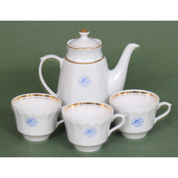 Porcelain jug and three cups 