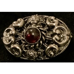Antique German brooch for national costume with garnet. Filigree. Last century. Excellent state of preservation