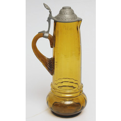Honey colored glass cup with metal finish