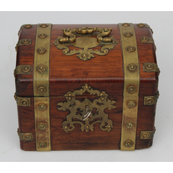 Wooden casket with metal finish and lock