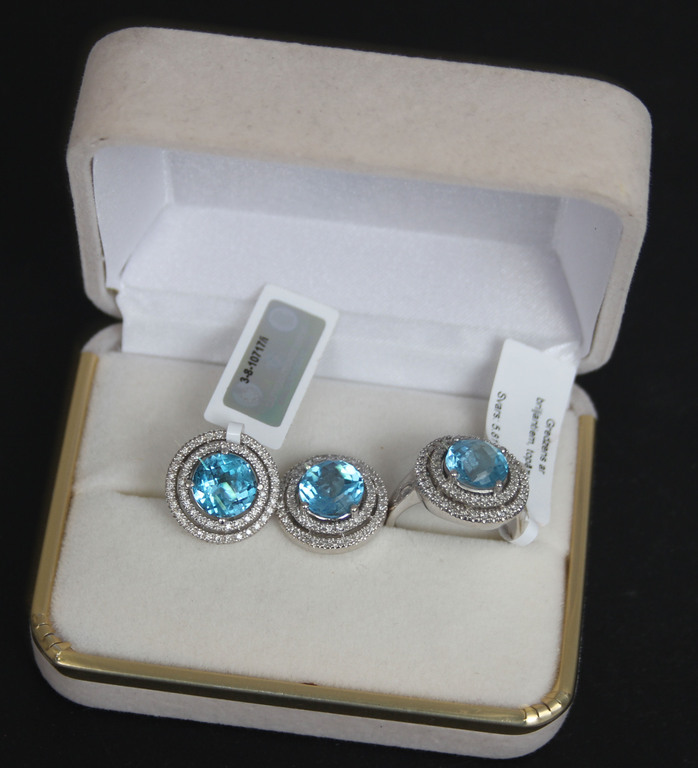 White gold ring and earrings with diamonds and topazes