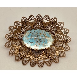Antique, large brooch with turquoise. Filigree weaving. Silver?