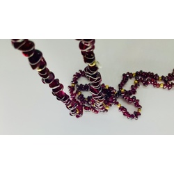 Long beads made of natural amethyst. Can be worn in two strands. Vintage. Excellent condition.