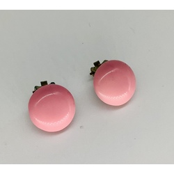 Pink coral clips, change color depending on different lighting. Old plastics. Last century
