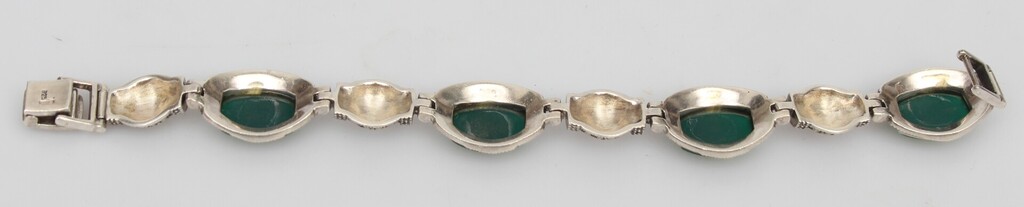 Silver bracelet with green stones