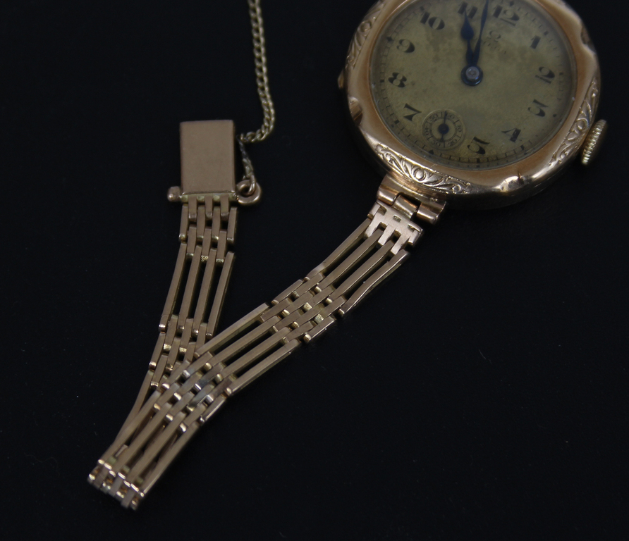 Золотые женские наручные часы 