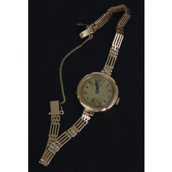 Gold women's wristwatch 