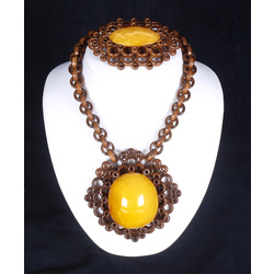 Jewelry set - necklace with a massive pendant and brooch