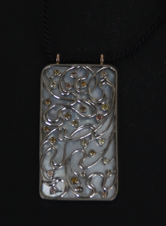 Gold pendant with diamonds with natural silk cord