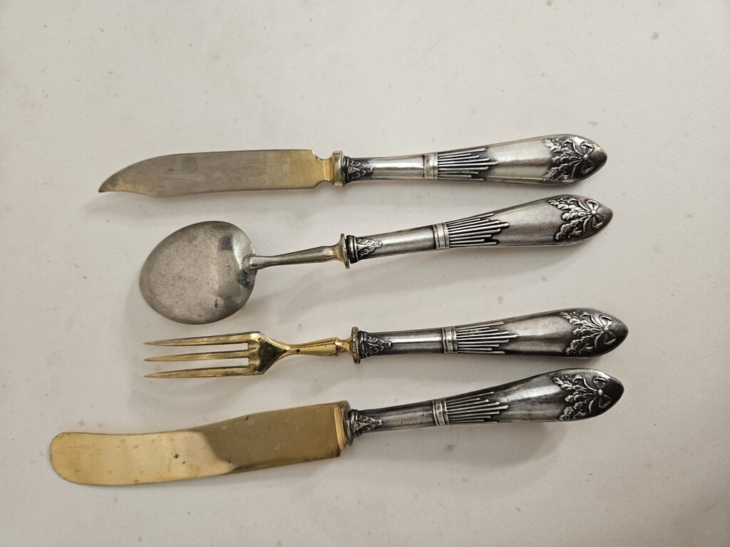 Cutlery with silver handles