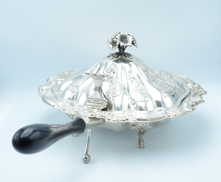 Silver hot dish with wooden handle