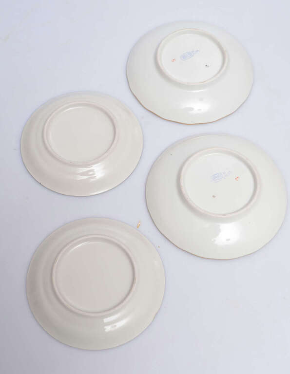 Saucers from various services 4 pcs.