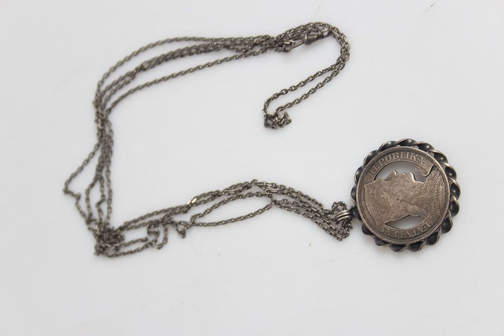 Necklace with a silver pendant
