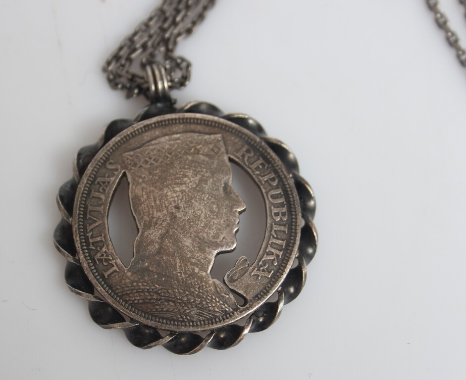 Necklace with a silver pendant