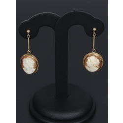 Gold earrings with a cameo