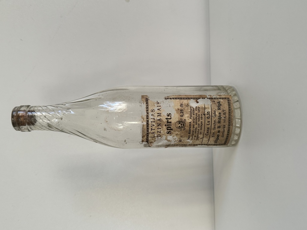 Two glass bottles, Latvian alcohol label