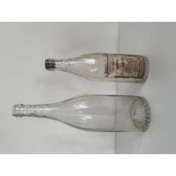 Two glass bottles, Latvian alcohol label