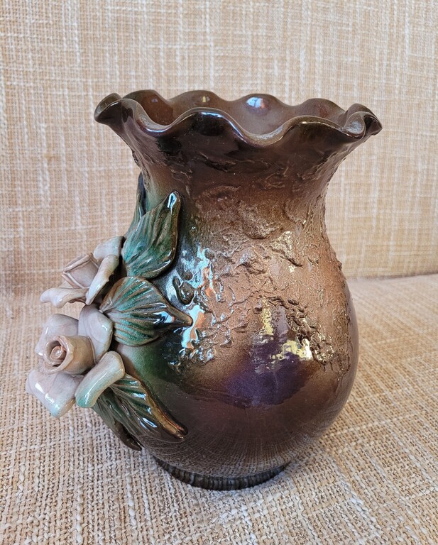 Ceramic vase with roses.