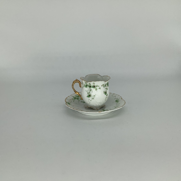 Russian Empire.Kuznetsov?private factories.Elegantly shaped coffee pair with herbal ornaments.fine porcelain