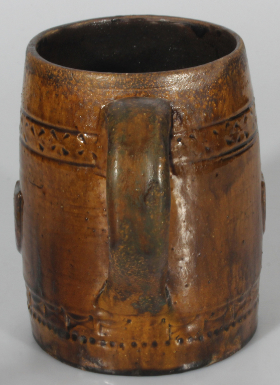 Ceramic beer mug with coat of arms