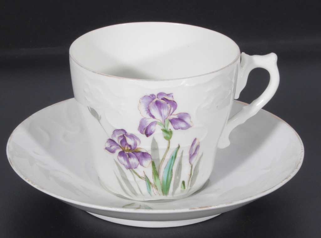 Art Nouveau style cup with saucer