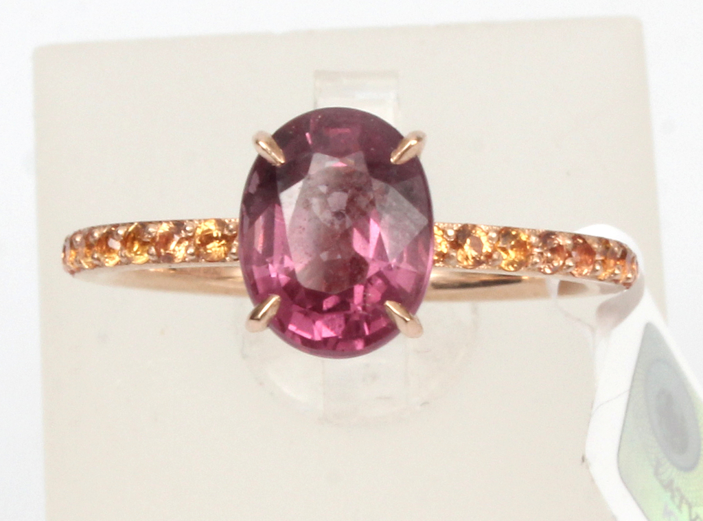 Gold ring with yellow sapphires and garnet 