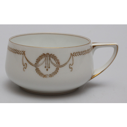 Porcelain cup with gilding