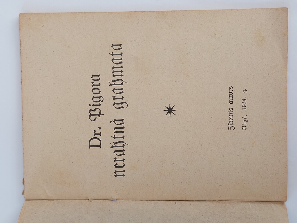 Dr. Pigora neratnā grāmata . Izdevis autors Rīgā 1924.g. vāku zīmējis R K.