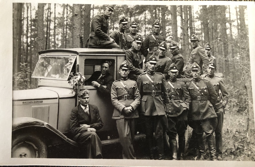 Cavalrymen of the Latvian army at the Chevrolet truck
