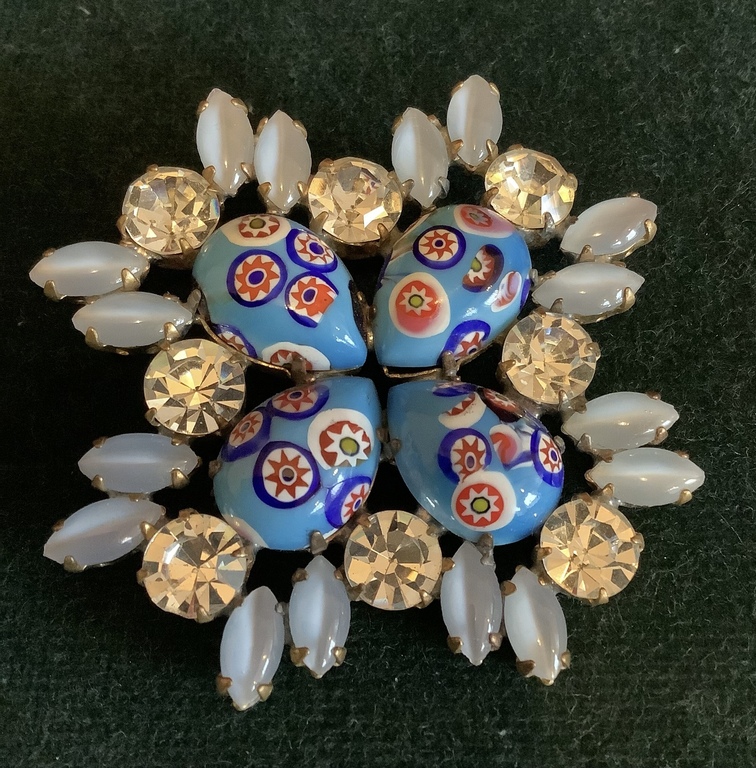 Large brooch with natural rhinestones. Petals made of porcelain and smoked milk glass. Handmade from the beginning of the last century.