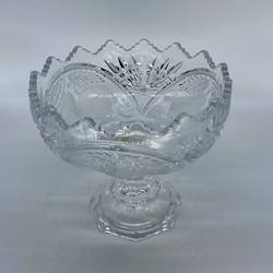 Fruit bowl made of lead crystal on a leg. Hand polished, hand carved. 90s.