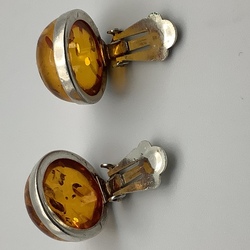Antique silver clips from Baltic amber with incuse. Art Deco. Beginning of the last century.