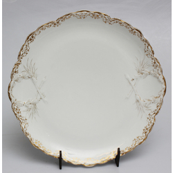 Cornilowi factory table plate with embossed and golden plant ornament