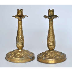 Bronze candlesticks with a stylized plant motif