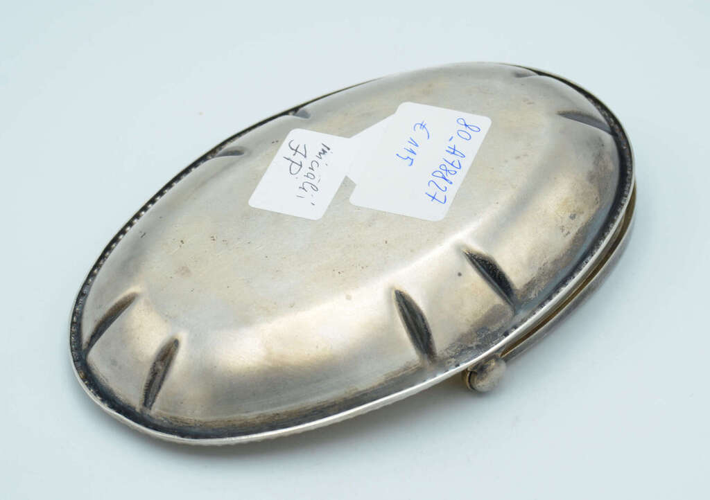 Silver bowl with a handle