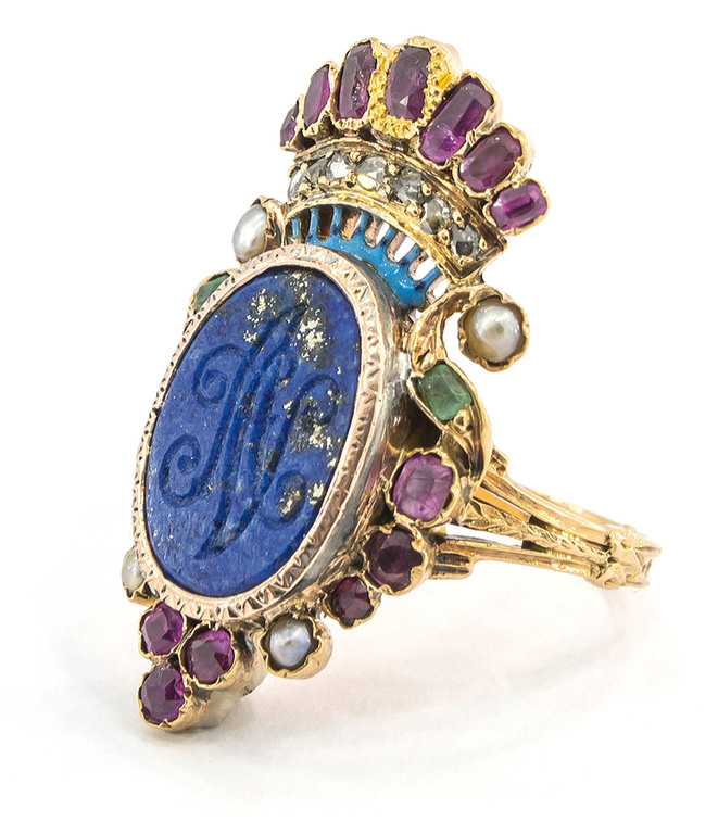 Golden ring with a monogram