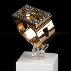 A man's golden ring with diamonds
