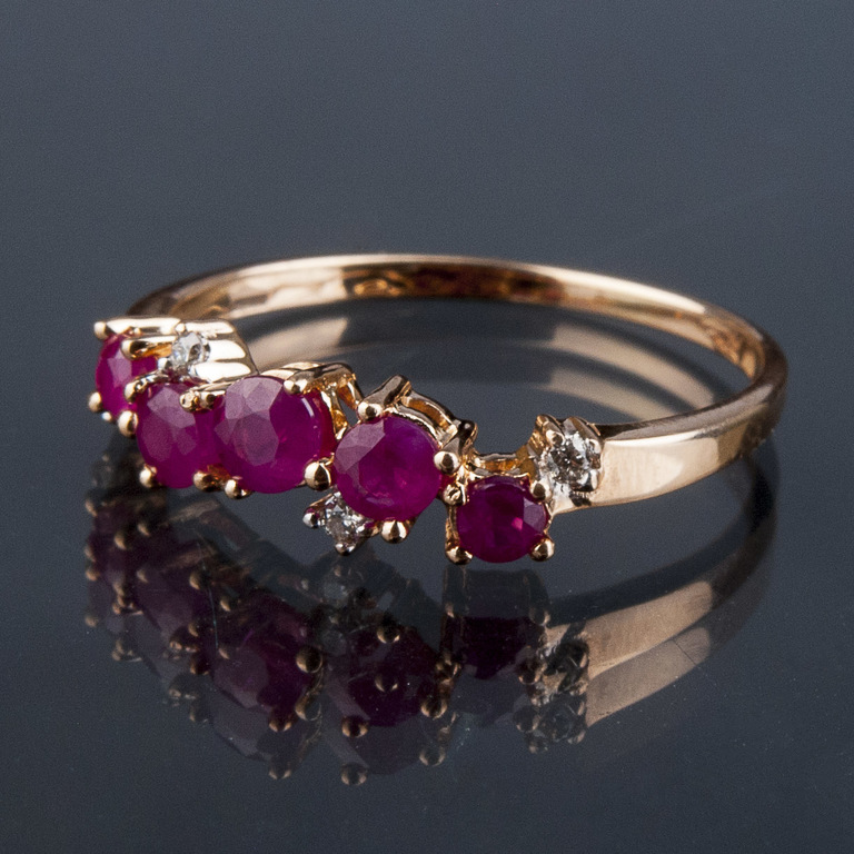 Golden ring with rubies and diamonds