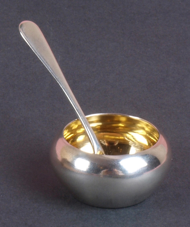 Silver spice jar with a spoon